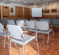 Chairs set up for a presentation in the Briarly Room.